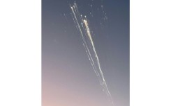 In this handout image courtesy of Greg Blee, debris from the SpaceX Starship is seen in the sky near Providenciales, Turks and Caicos on January 16, 2025