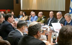 An Israeli Government Press Office picture shows Prime Minister Benjamin Netanyahu (2-R), heading the security cabinet meeting