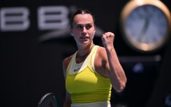 Aryna Sabalenka celebrates beating Mirra Andreeva