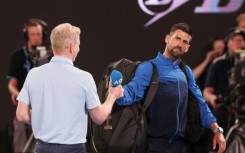 Novak Djokovic (R) refused to do an on-court interview after his last 16 match at the Australian Open  