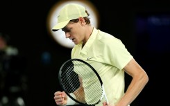 Jannik Sinner celebrates match point against Ben Shelton