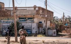 Sudanese army soldiers patrol an area in Khartoum North on November 3, 2024