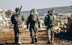 A handout picture from the Israeli military of its troops in southern Lebanon, where they had been due to withdraw from this week