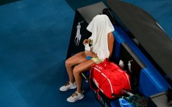 Aryna Sabalenka sits after her defeat against USA's Madison Keys 