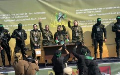 Hamas militants hand over Israeli female hostages to Red Cross