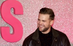 Up and coming British actor Leo Woodall also stars as Bridget's much younger love interest