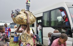 A Congolese refugee fleeing ongoing clashes 