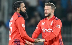 Adil Rashid (L) and Ben Duckett (R) starred as England kept their T20 series against India alive