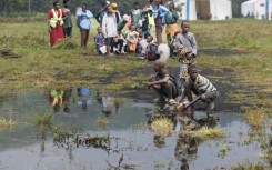 Rwanda says at least 1,200 have been registered at one camp on the border