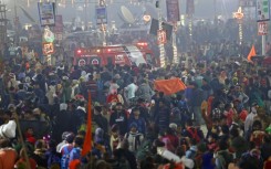 An ambulance arrives at the site of a stampede amid the ongoing Maha Kumbh Mela festival in Prayagraj 