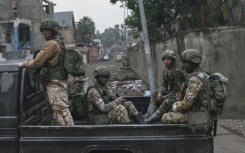 Members of the M23 armed group during a patrol in Goma, a vital trading hub that they mostly now control 