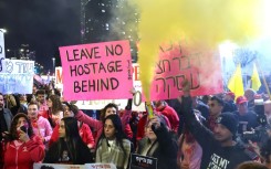 Israeli supporters of the hostages, who have kept up a campaign for their negotiated release for months, demonstrate in Tel Aviv on Saturday.