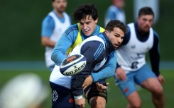 Antoine Dupont (R) made his Test deut in 2017