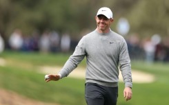 Rory McIlroy acknowledges the crowd after his opening round hole-in-one at the PGA Tour's Pebble Beach Pro-Am tournament in California on Thursday