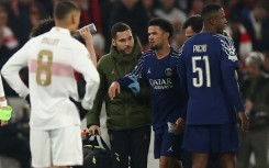 Warren Zaire-Emery (2nd R) limped off the field in the final minutes of PSG's win at Stuttgart