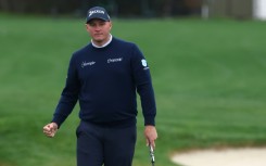 Sepp Straka of Austria celebrates a birdie putt at the 17th hole on his way to taking a one-stroke lead after three rounds at the PGA Pebble Beach Pro-Am