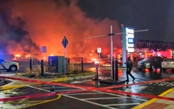 Fires and plumes of smoke in northeast Philadelphia after a small aircraft crashed on January 31, 2025 near a strip mall