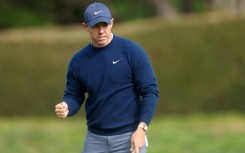 Third-ranked Rory McIlroy of Northern Ireland celebrates sinking an eagle putt at the 14th hole in the final round on his way to victory at the PGA Pebble Beach Pro-Am