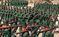 Members of the Mandalay People's Defense Forces rebel group marching in a graduation ceremony after training at a camp in an undisclosed location in Myanmar's northern Shan State in December