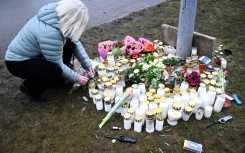 Tributes were left at the adult education centre where 10 people were killed by a gunman on Tuesday