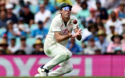 Pat Cummins takes a catch in the recent Test series against India