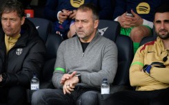 Barcelona coach Hansi Flick (C) said his team would not hide behind excuses and complaints this season