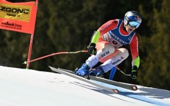 Switzerland's Marco Odermatt made it back-to-back world championship golds in the super-G