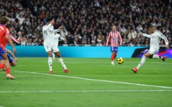 Real Madrid's Kylian Mbappe levels for his side in the derby clash against Atletico Madrid
