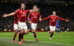 Manchester United defender Harry Maguire (left) celebrates his winning goal against Leicester