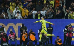 Al Nassr's Portuguese forward Cristiano Ronaldo celebrates scoring in the Saudi Pro League 