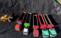 Trucks being loaded with coal in Lianyungang, in eastern China's Jiangsu province