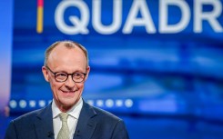 Friedrich Merz, main candidate of the Christian Democratic Union (CDU), in the TV studio holding Sunday's four-way debate
