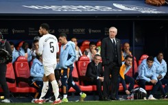 Jude Bellingham (L) scored against Man City in Europe but was then sent off against Osasuna in La Liga as Madrid dropped points
