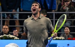 Matteo Berettini celebrates a long-awaited victory  over Novak Djokovic 