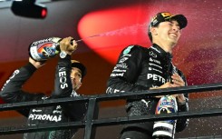 George Russell (R) with runner-up and then Mercedes team-mate Lewis Hamilton (L) after winning last season's Las Vegas Grand Prix