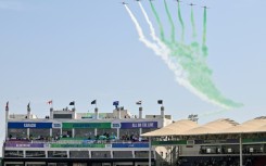 Pakistan Air Force jets fly over the National Stadium in Karachi at the opening ceremony of the ICC Champions Trophy tournament