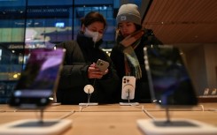 Apple's iPhone is facing intense competition in China, where Alibaba Group has confirmed an artificial intelligence partnership with the Silicon Valley tech titan