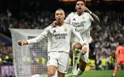 Real Madrid's French forward Kylian Mbappe celebrates scoring his team's second goal in the rout of Man City