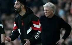 Ruben Amorim (left) believes Man Utd just have to "survive" a dreadful season