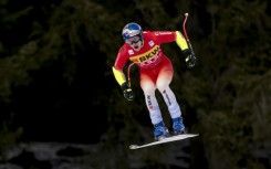 Marco Odermatt flies to victory oin the World Cup super-G at Crans-Montana