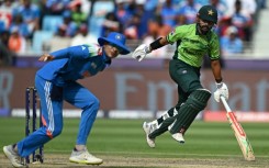 Running man: Pakistan's Saud Shakeel (R) was his team's top scorer 