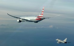 This handout picture taken and released by the Italian Air Force shows the American Airlines flight being escorted by a fighter jet