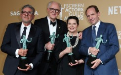 'Conclave' cast members (L-R) Sergio Castellitto, John Lithgow, Isabella Rossellini and Ralph Fiennes celebrate the film's win for best cast in a motion picture at the Screen Actors Guild Awards