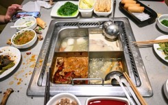 In a froth over the broth: a Haidilao hotpot restaurant in Beijing