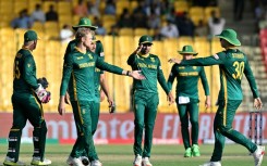 South Africa players celebrate in Karachi