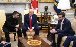 US President Donald Trump (C) and Vice President JD Vance (R) meet with Ukrainian President Volodymyr Zelensky (L) in the Oval Office on February 28, 2025