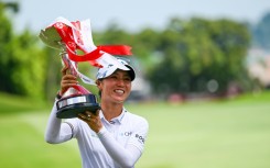 Lydia Ko celebrates with with the trophy after winning the HSBC Women's World Championship 