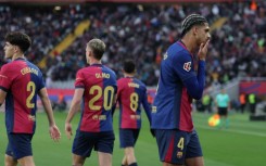 Barcelona's Uruguayan defender Ronald Araujo celebrates scoring his team's third goal against Real Sociedad