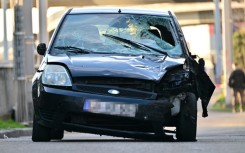A damaged car is pictured at the site of the car ramming 