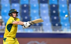 Australia's captain Steve Smith plays a shot against India